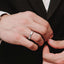 Beveled Wedding Band 4 mm by Dorah in 14K White Gold, worn by a black man