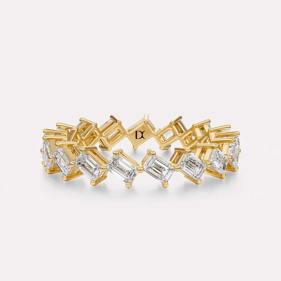 Diagonal Emerald Eternity Band
